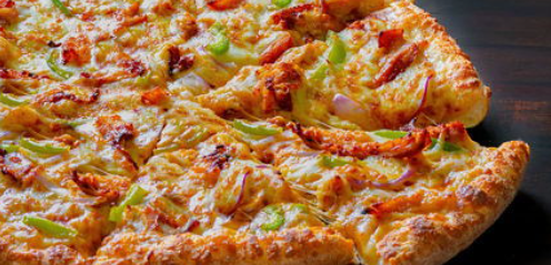 Butter Chicken Pizza at Canadian Pizza Unlimited Edmonton Halal fusion